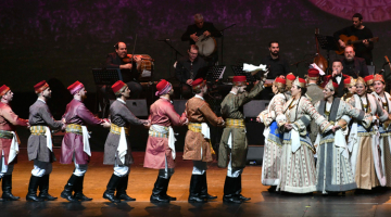 Singing our Asia-Minor yearning soothes